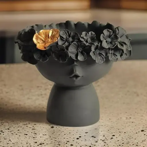 Queen face resin statue